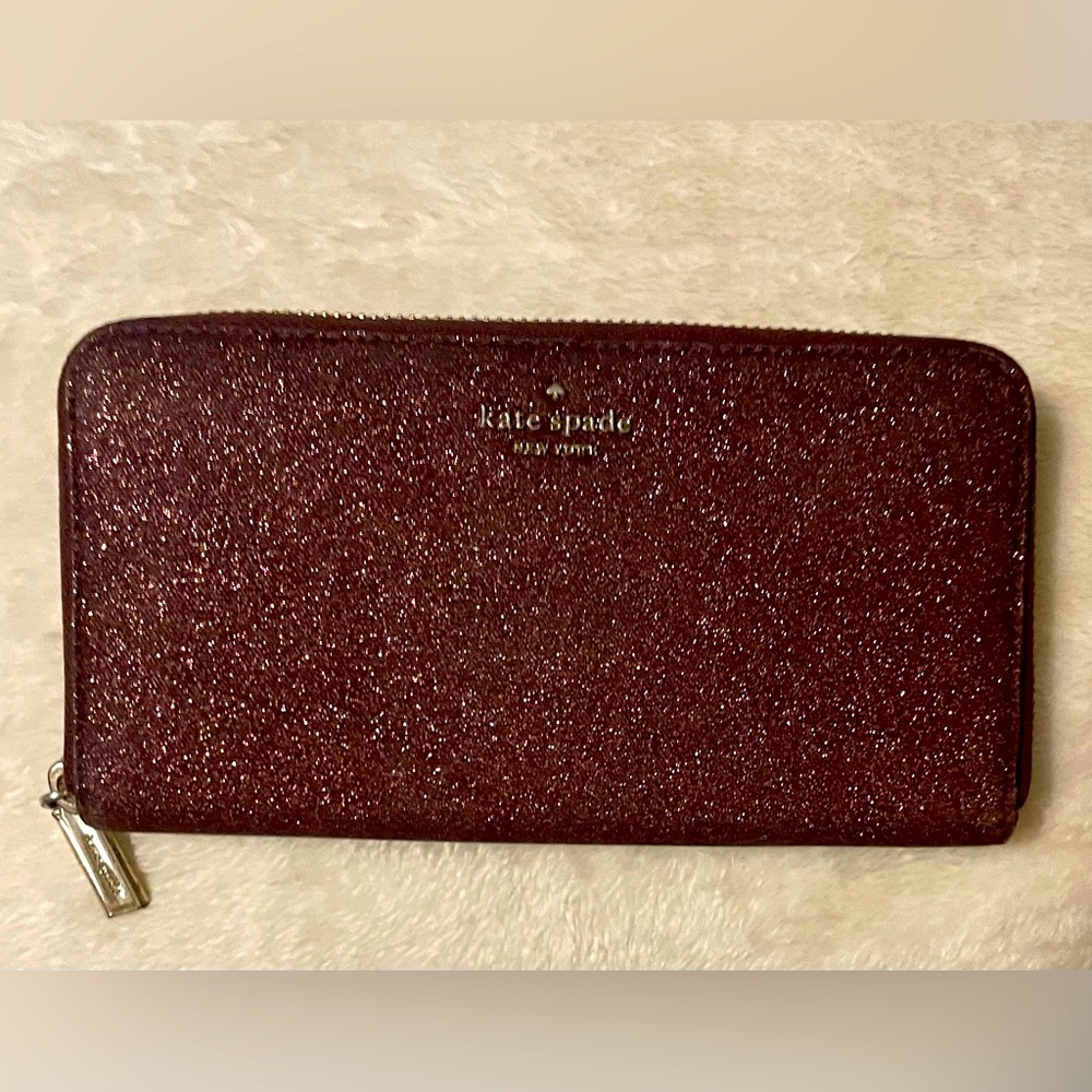 Kate Spade-glitter wallet, small scuff on back but otherwise like new.